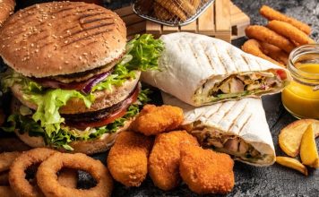Fastfood Kültürünün Yükselişi ve Etkileri Dünya genelinde hızla yaygınlaşan fastfood kültürü, modern yaşam tarzının en dikkat çeken alışkanlıklarından biri haline geldi. Özellikle 20. yüzyılın ikinci yarısından itibaren Amerika’da doğup tüm dünyaya yayılan bu kültür, kısa sürede milyonlarca insanın günlük hayatına yerleşti. Hızlı, pratik ve görece ucuz olması nedeniyle tercih edilen fastfood, insanların yoğun iş temposu ve zaman sıkıntısı yaşadığı modern şehir yaşamında büyük bir kolaylık sağladı. Konulu bir haber görseli.